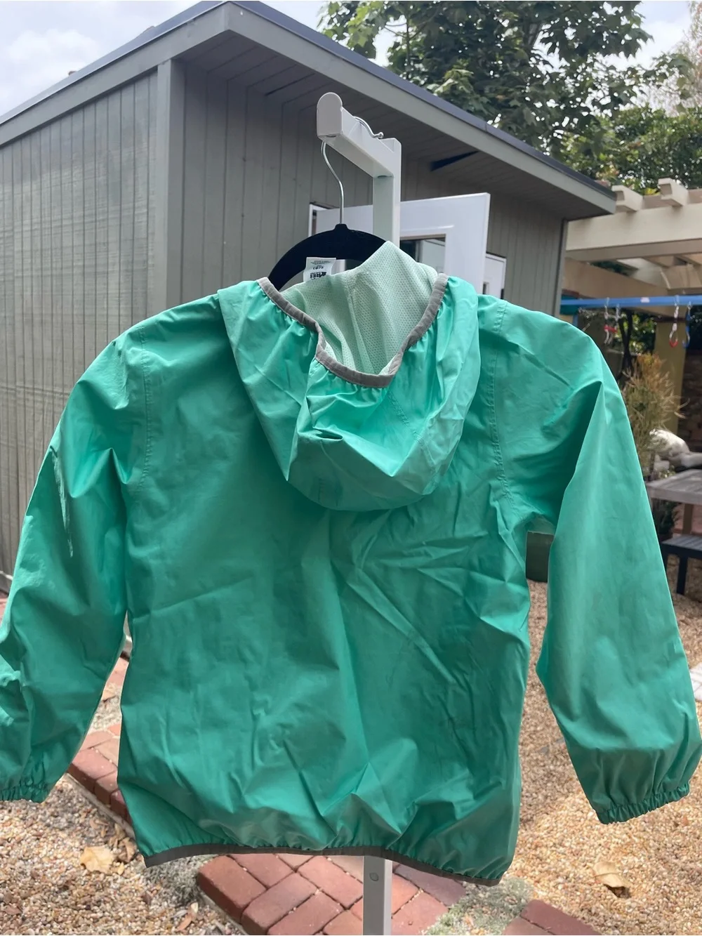 REI Kids' Hooded rain Jacket in Teal Green